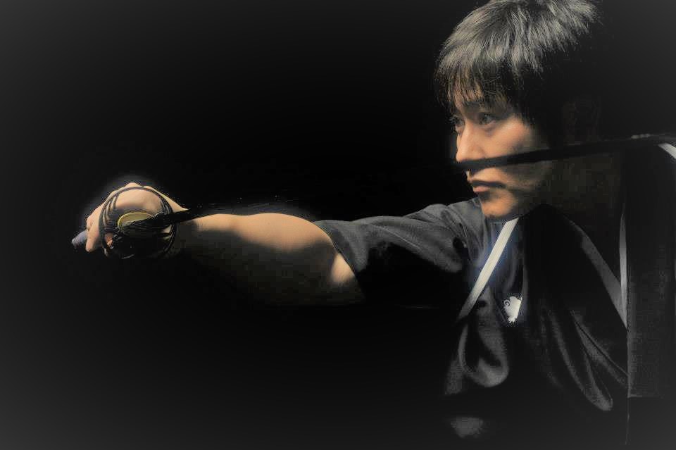 Isao Machii with sword photo